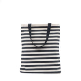 Andy Warhol tote bag back view with black and white horizontal stripes on a white background