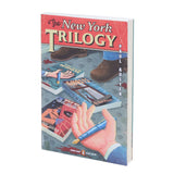Book cover of 'The New York Trilogy' by Paul Auster.